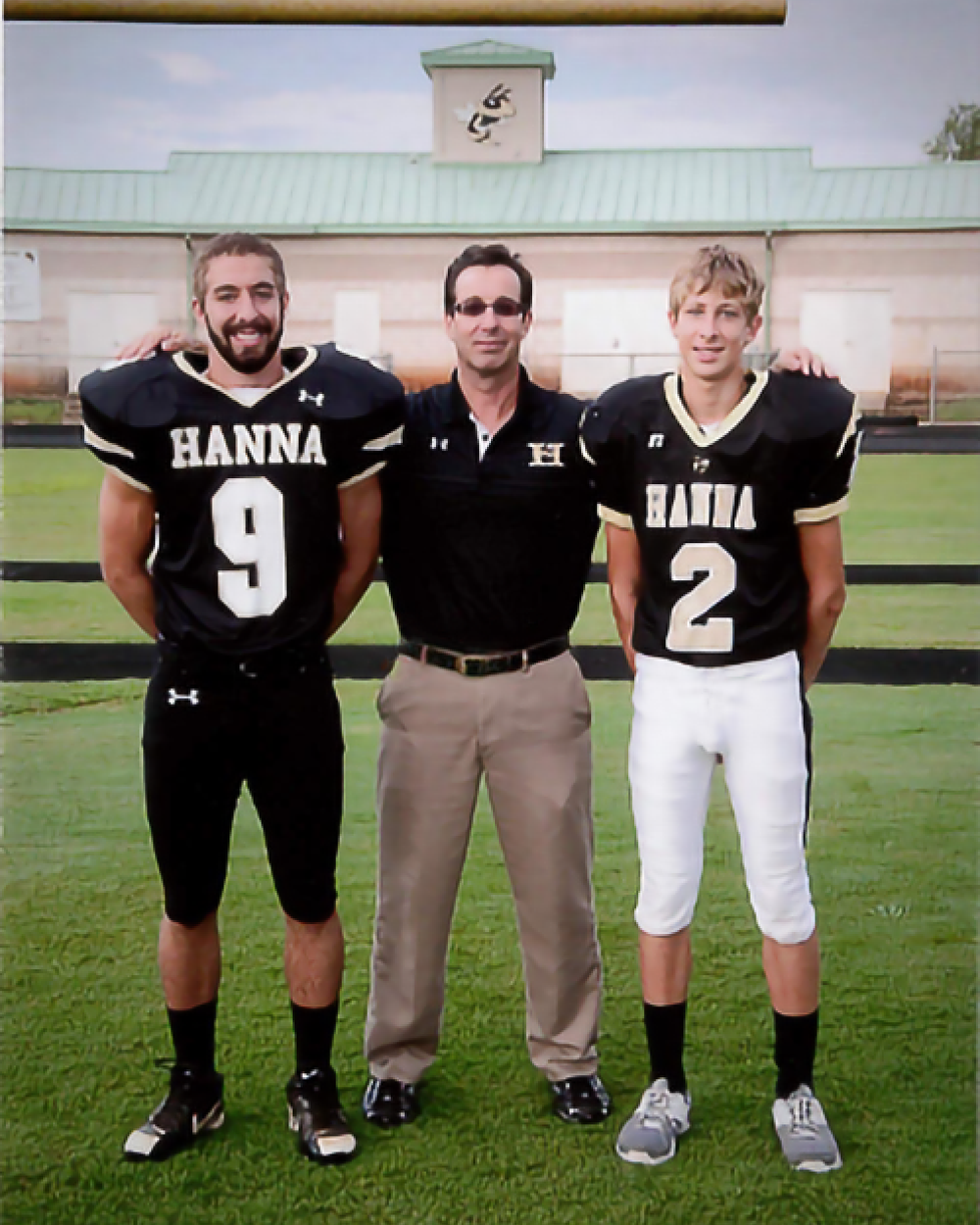 Photo of Tony Catalfomo with two football players